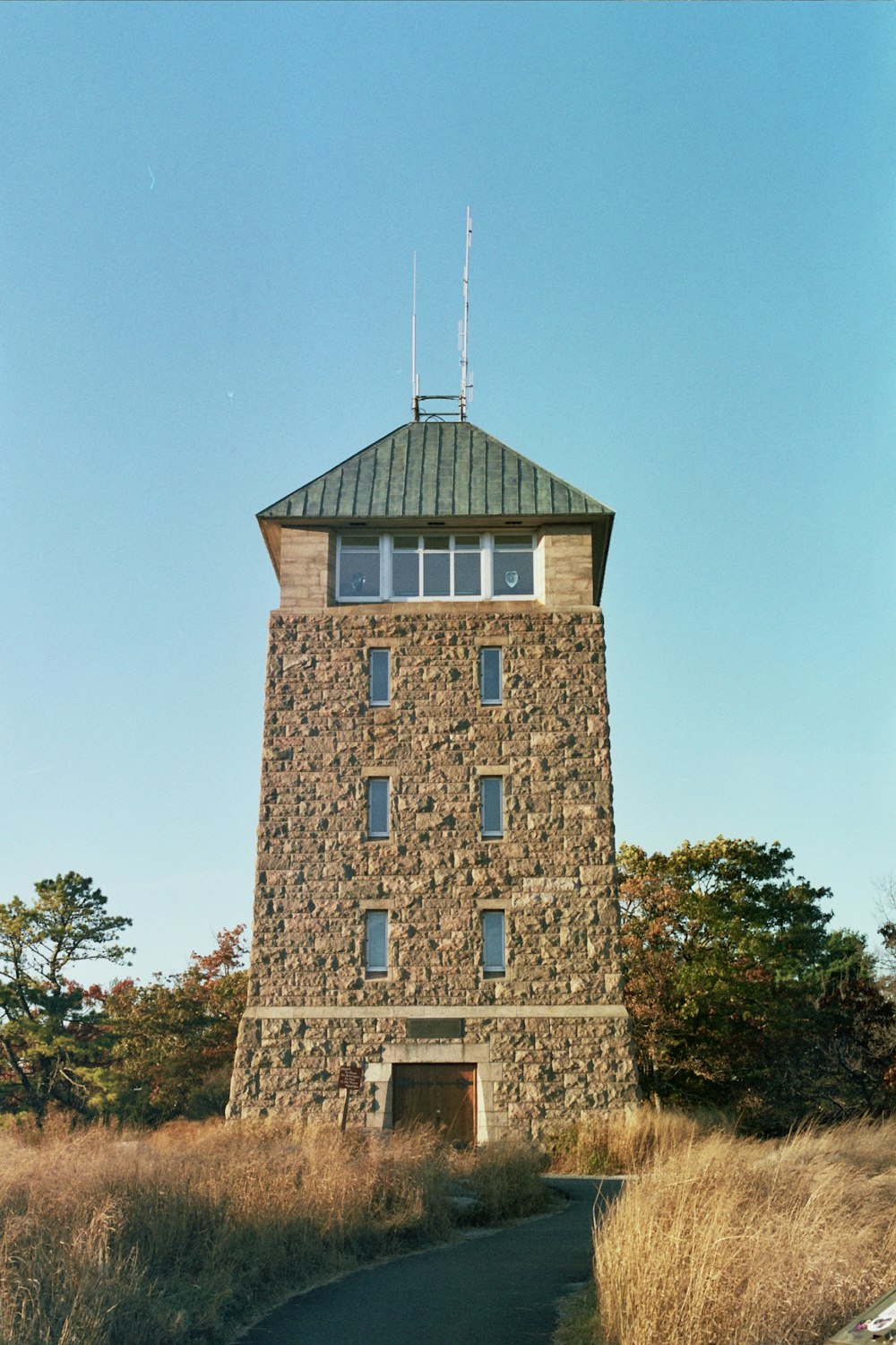 a tall tower with a clock on top of it