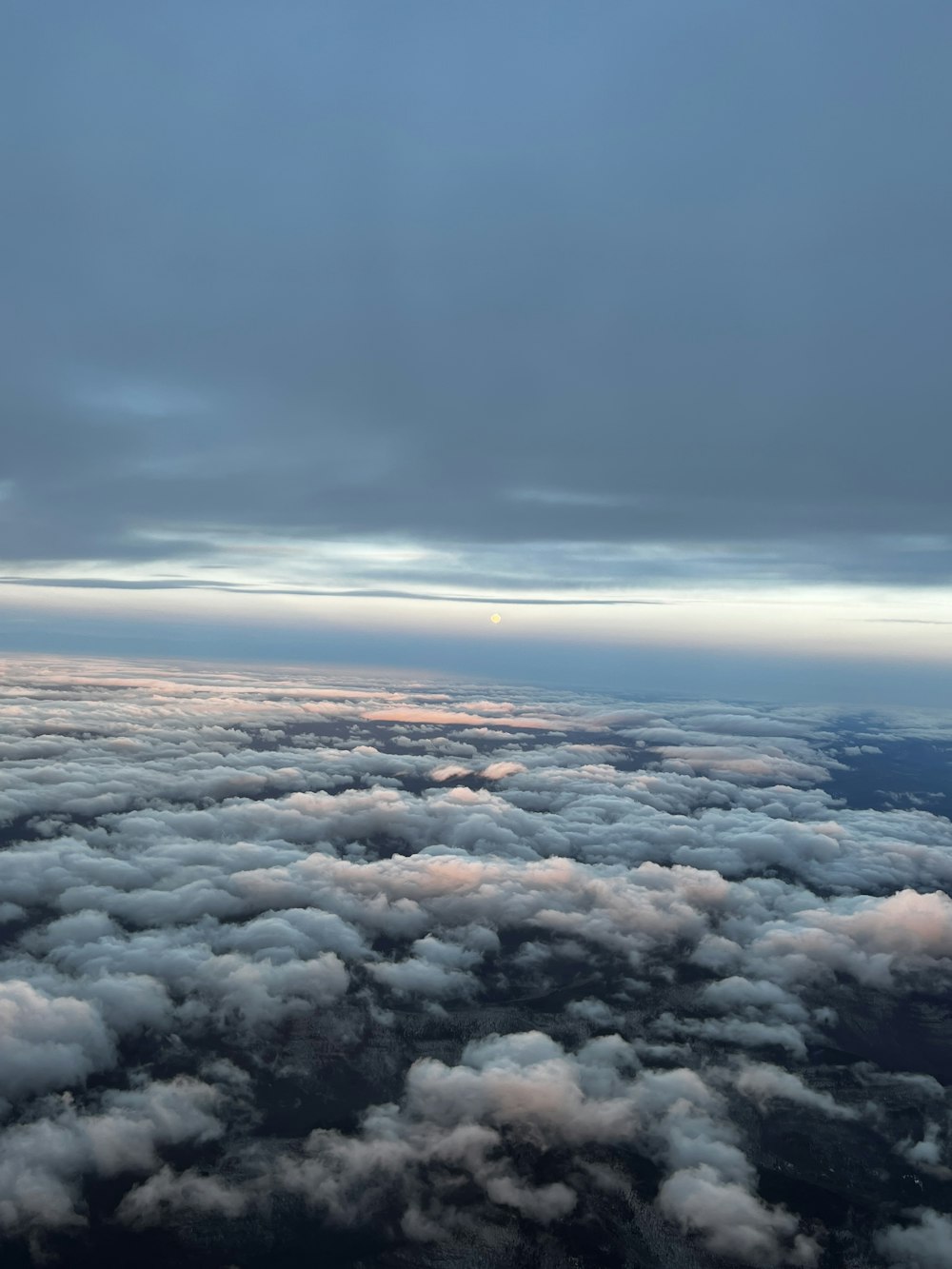 a view of the sky and clouds from an airplane