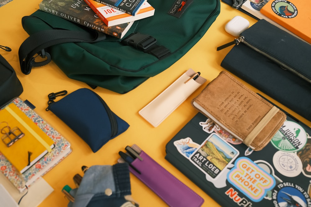 the contents of a backpack laid out on a table