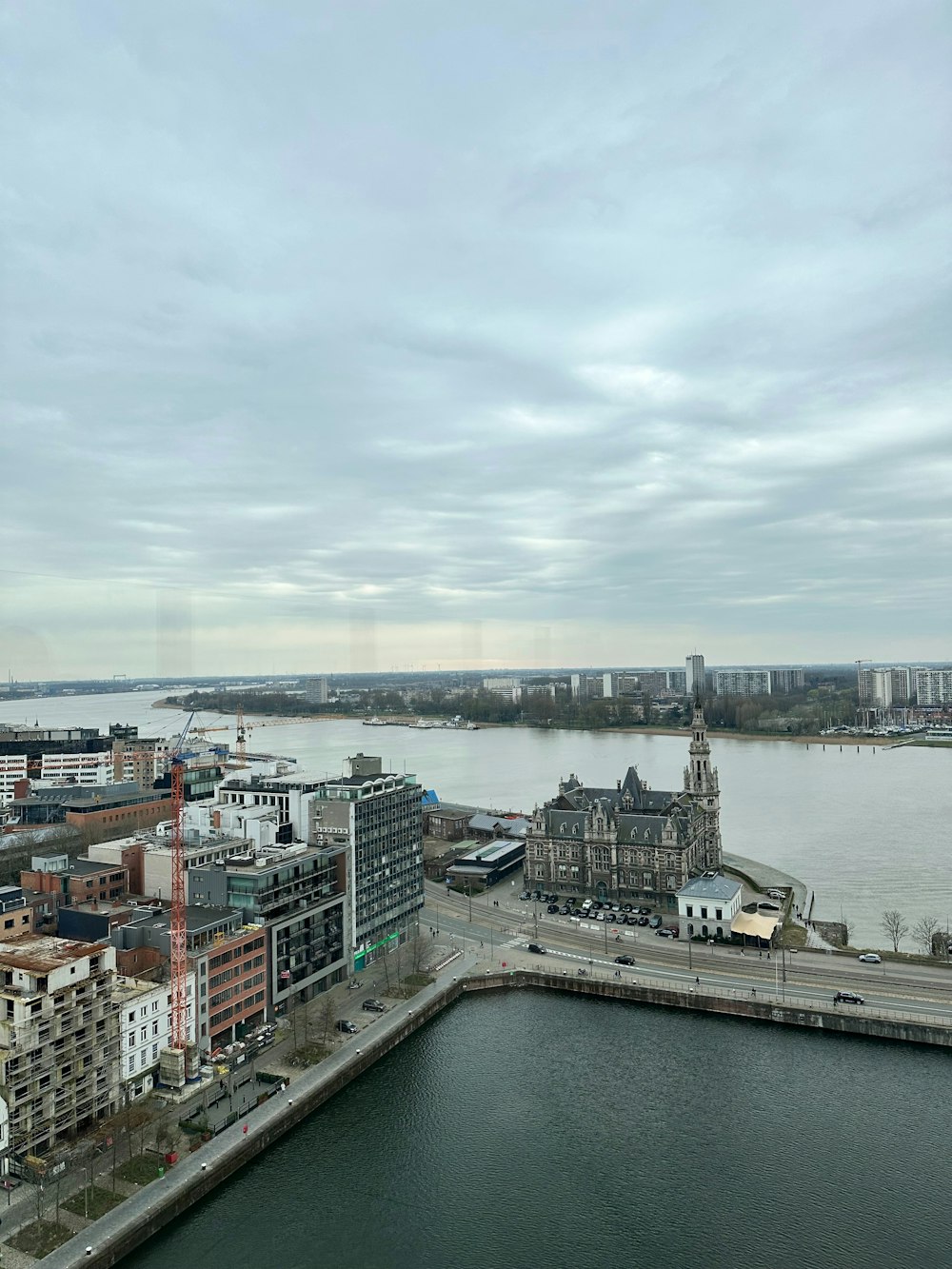 a large body of water next to a city