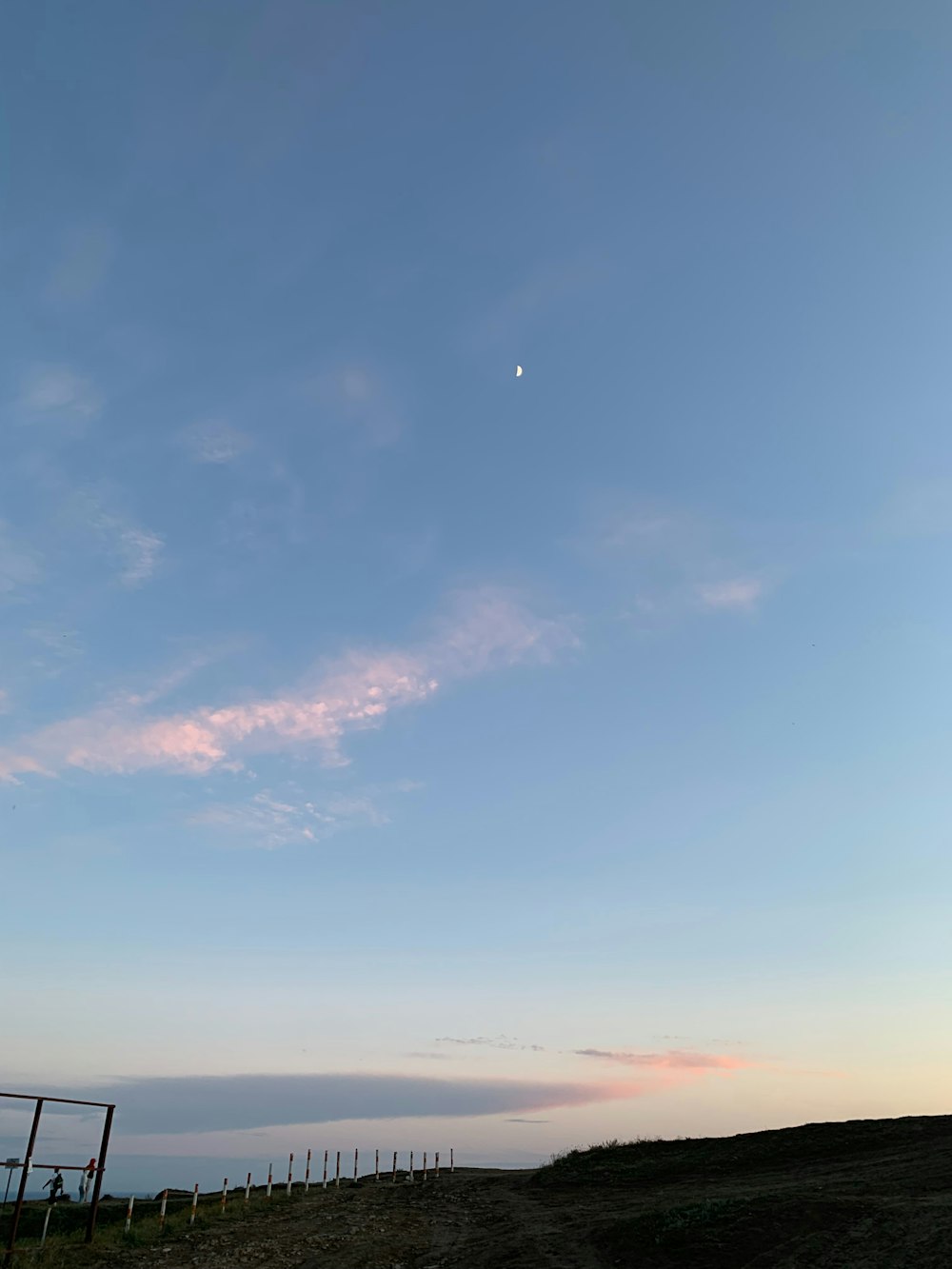 a person flying a kite in the sky