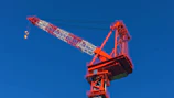 a large crane is on top of a building
