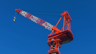 a large crane is on top of a building
