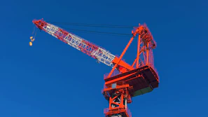 a large crane is on top of a building