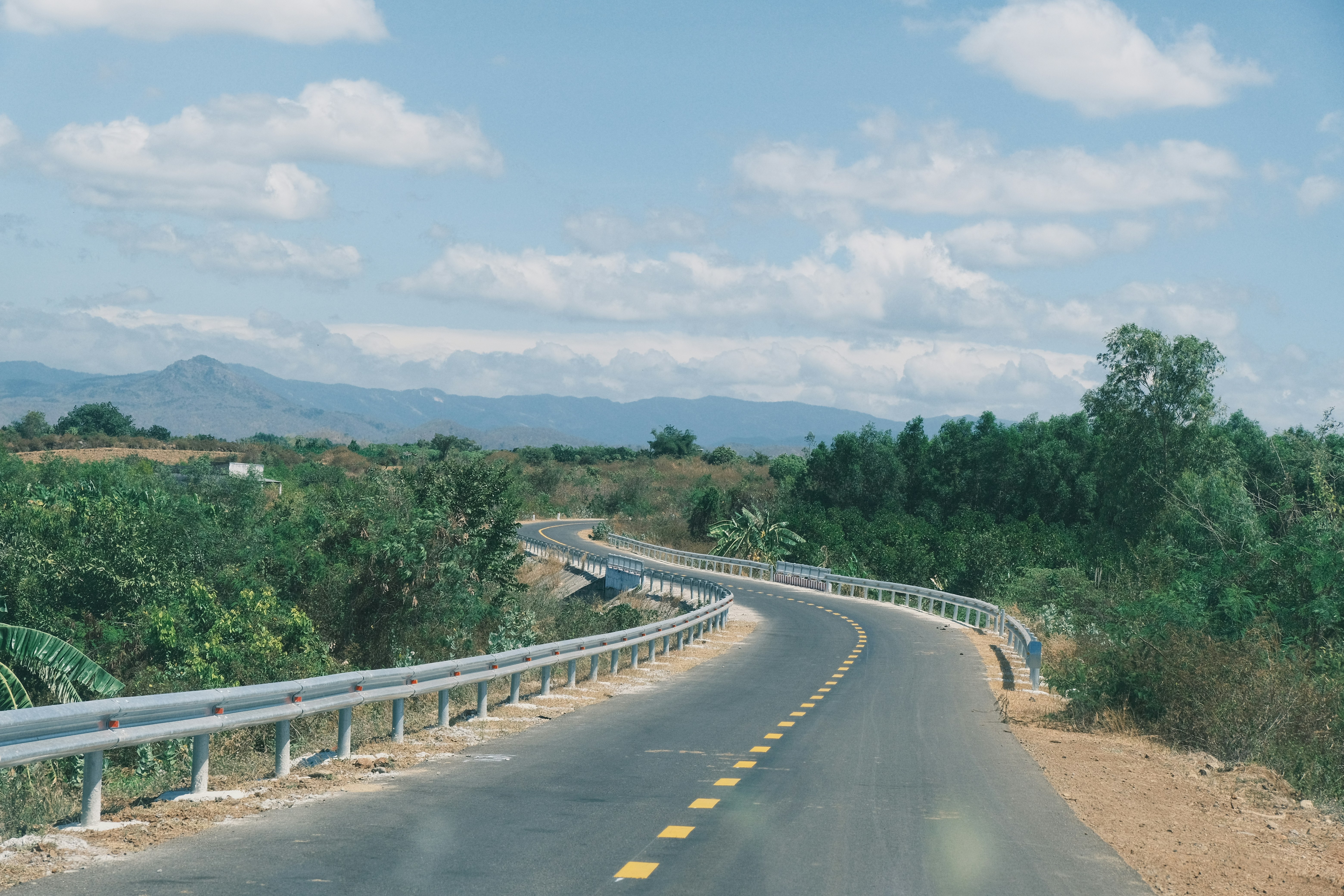 a road with a curve in the middle of it