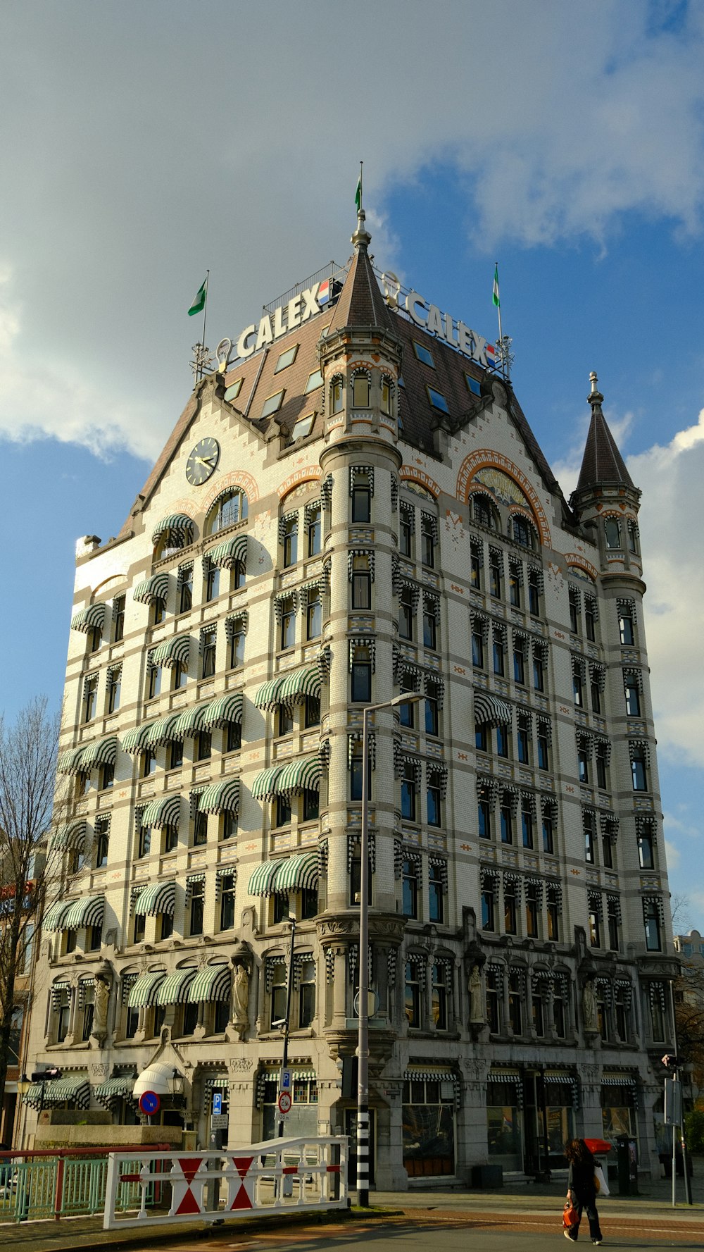 a tall building with a clock on the top of it