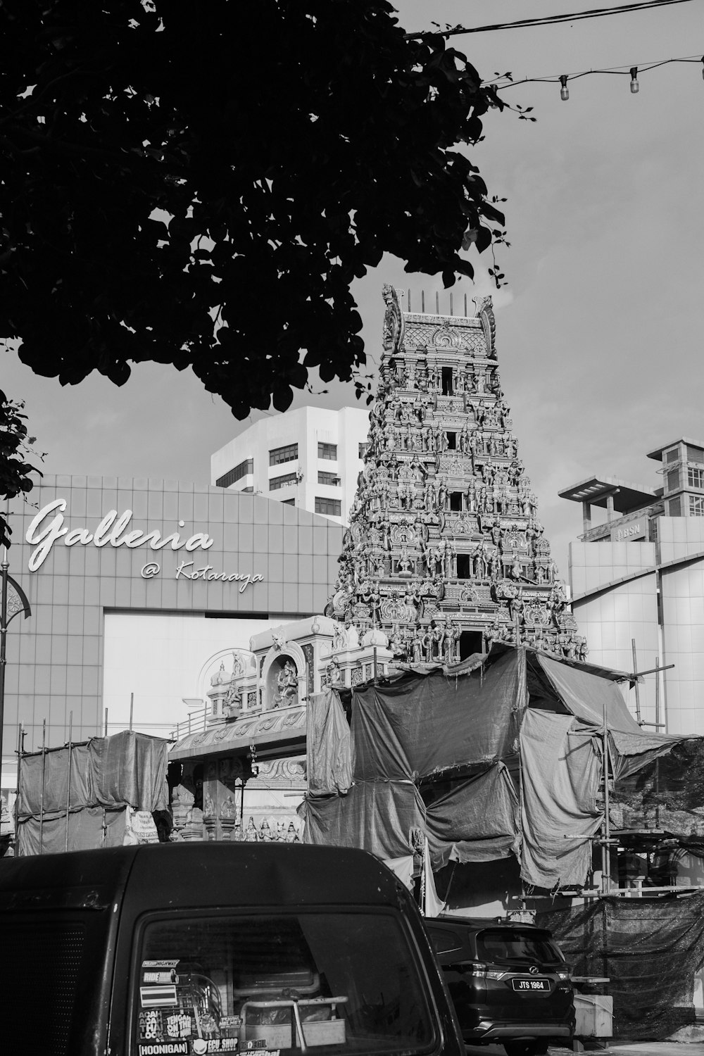 a black and white photo of a very tall building