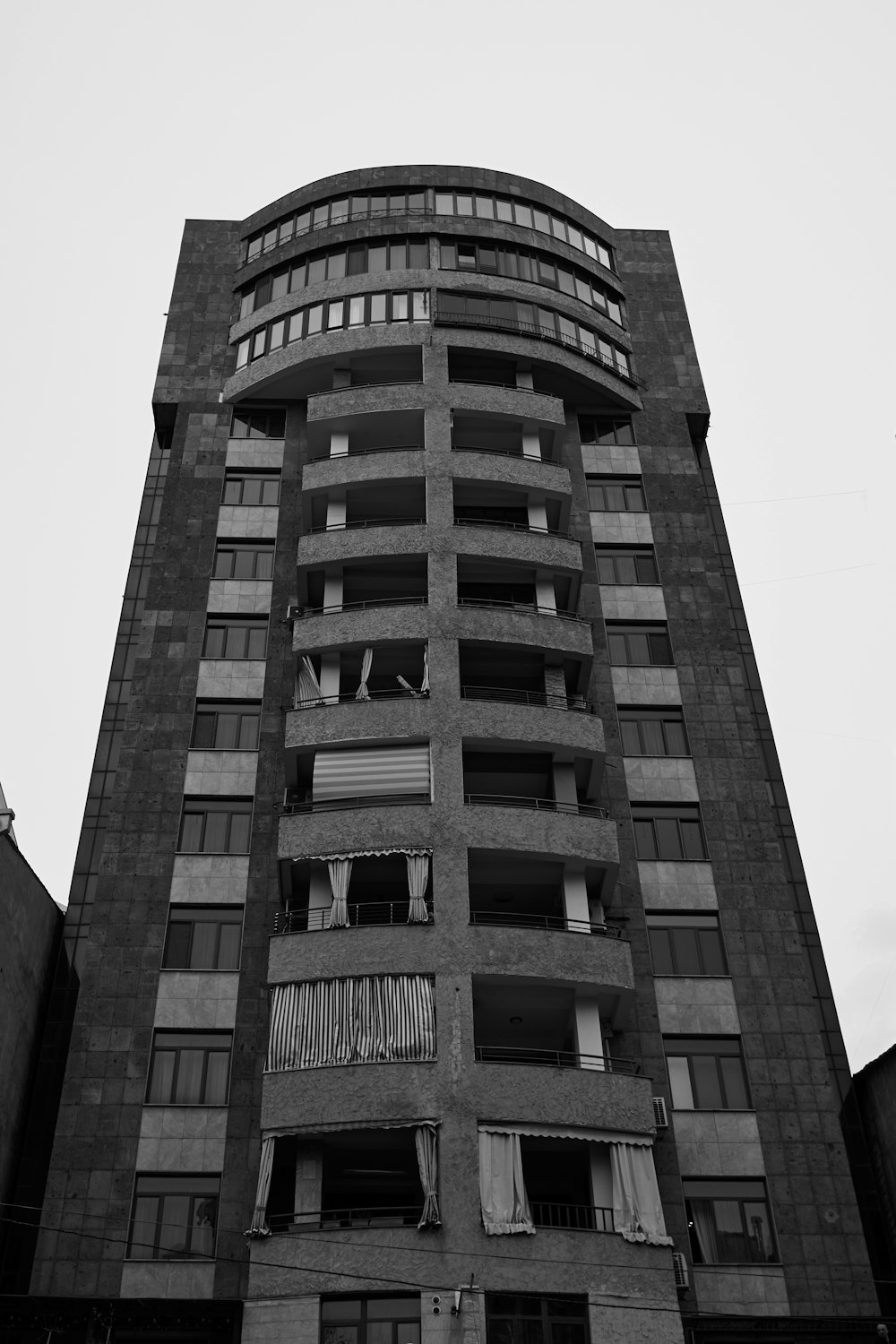 a black and white photo of a tall building