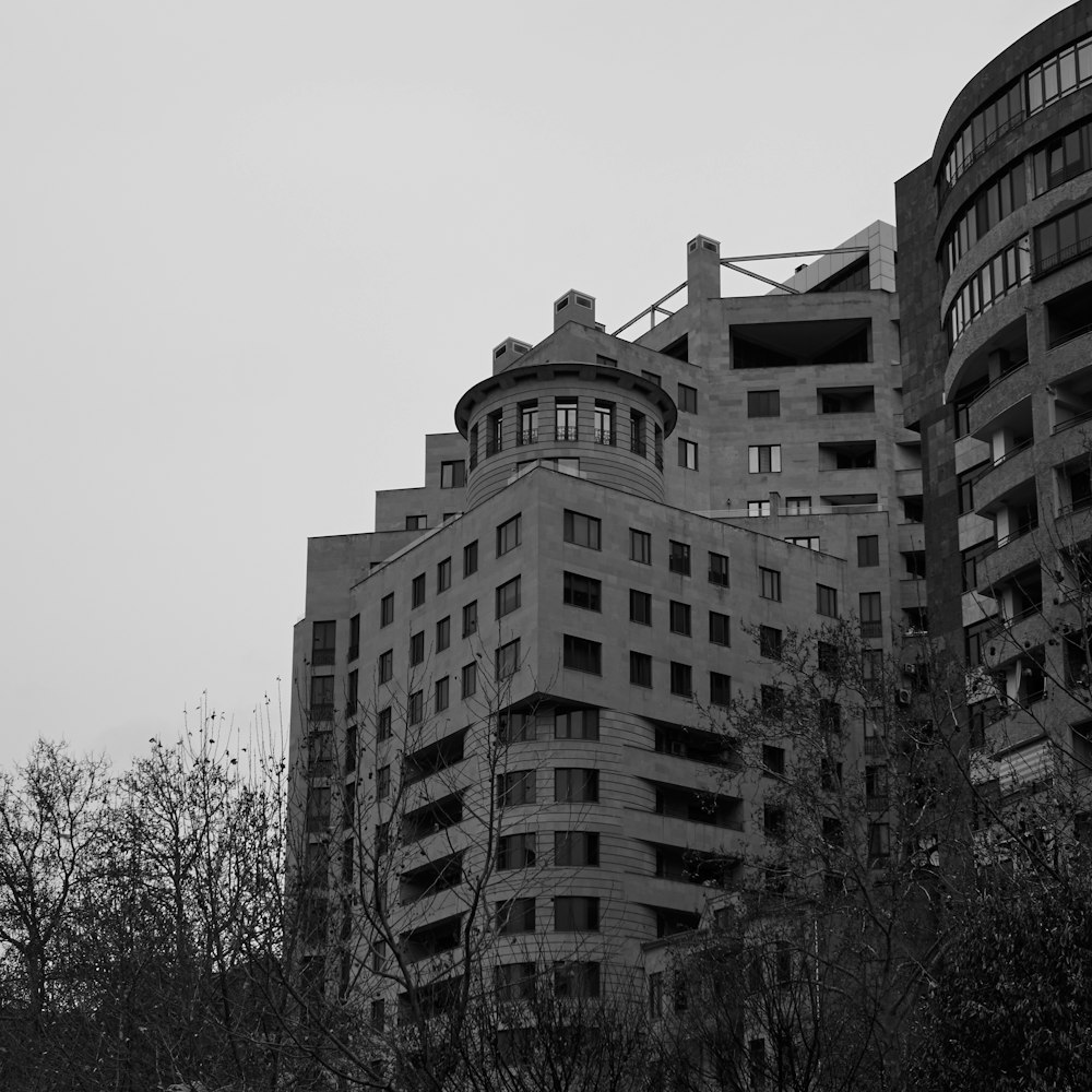 a black and white photo of a very tall building