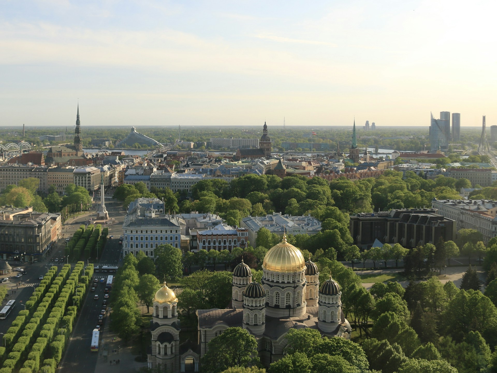 an aerial view of a city with trees and buildings