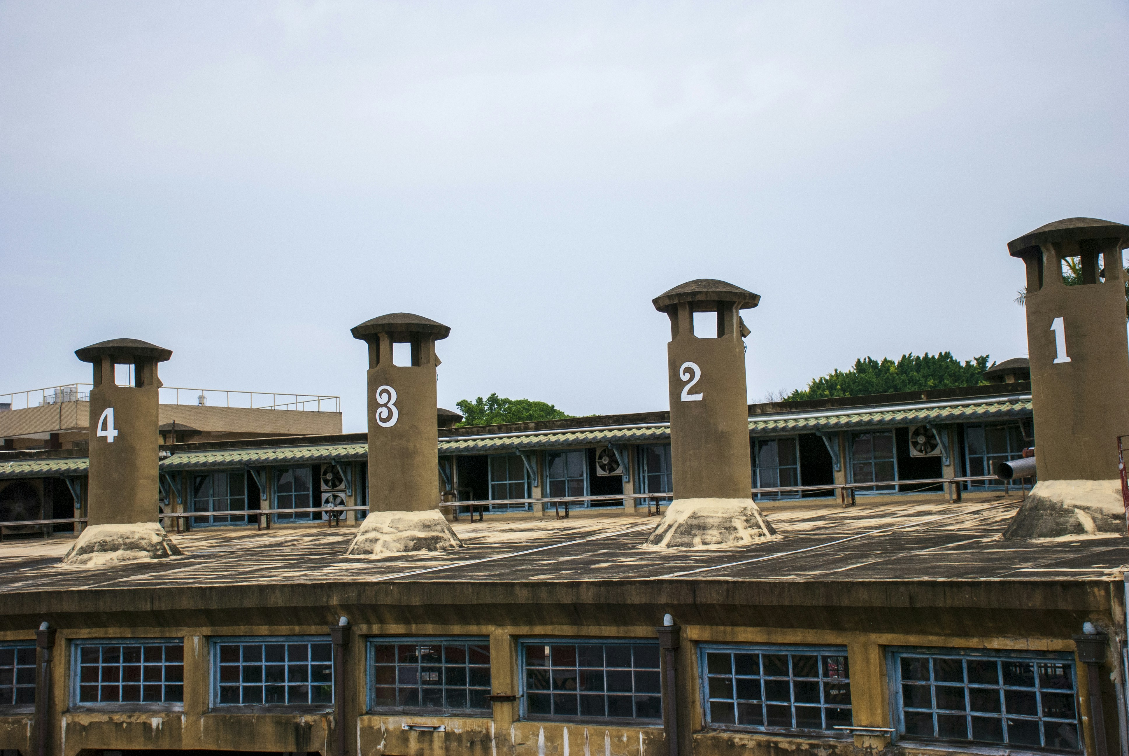 the roof of a building with a number on it