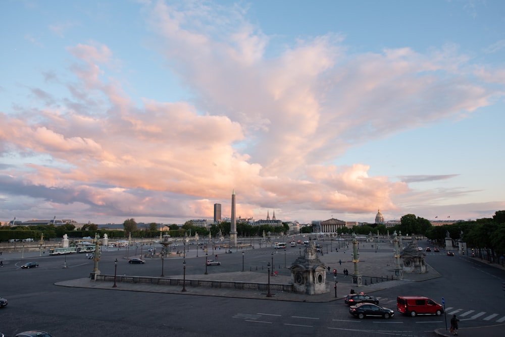 a parking lot with cars parked on the side of it