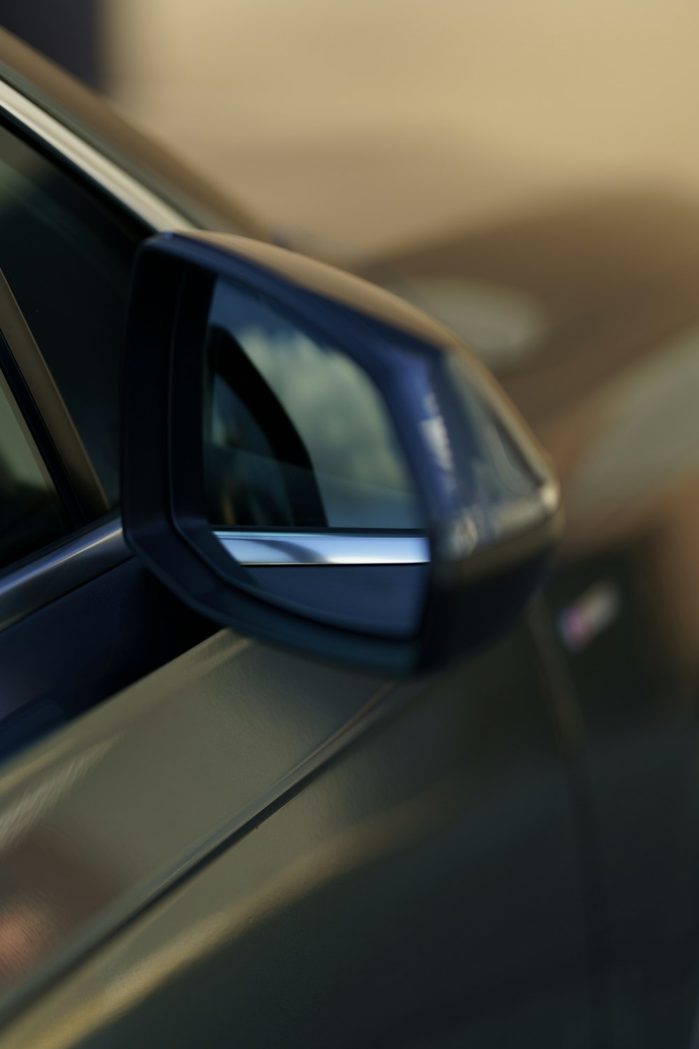 a close up of a car's side view mirror