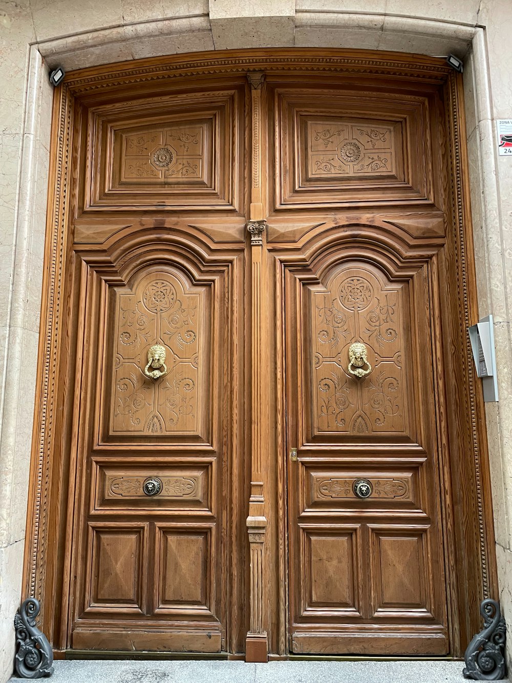 a large wooden door with ornate carvings on it