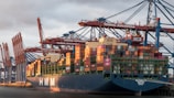 a large cargo ship loaded with lots of containers