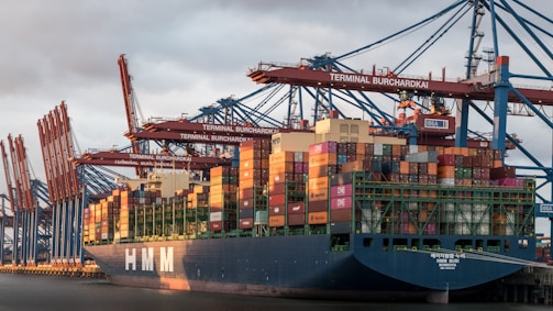 a large cargo ship loaded with lots of containers
