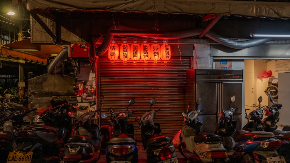 a group of motorcycles parked in front of a building