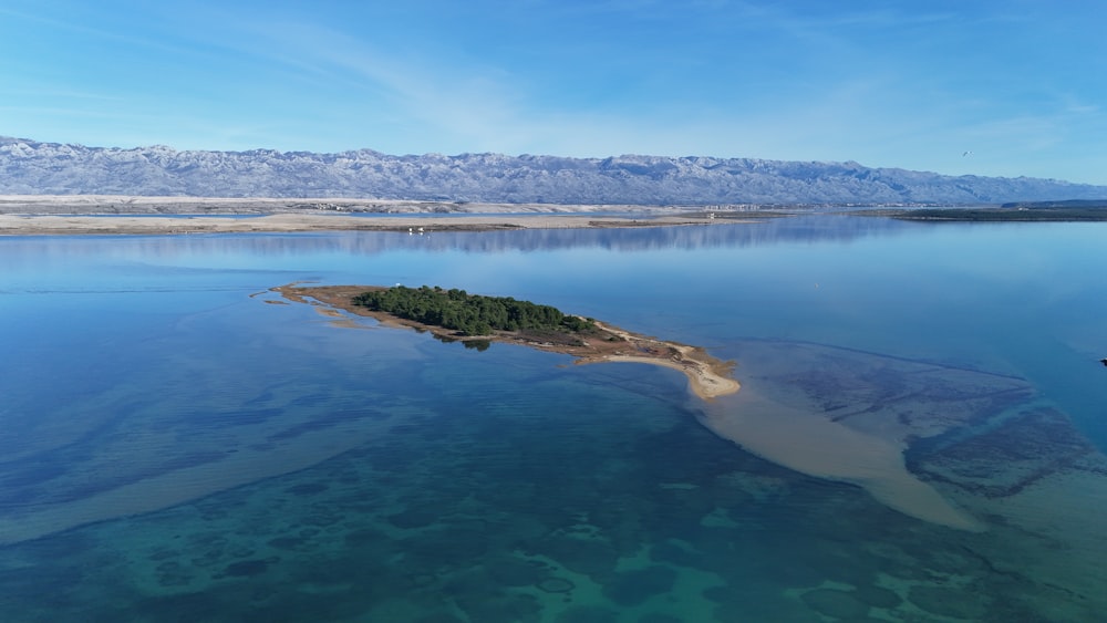 a small island in the middle of a large body of water