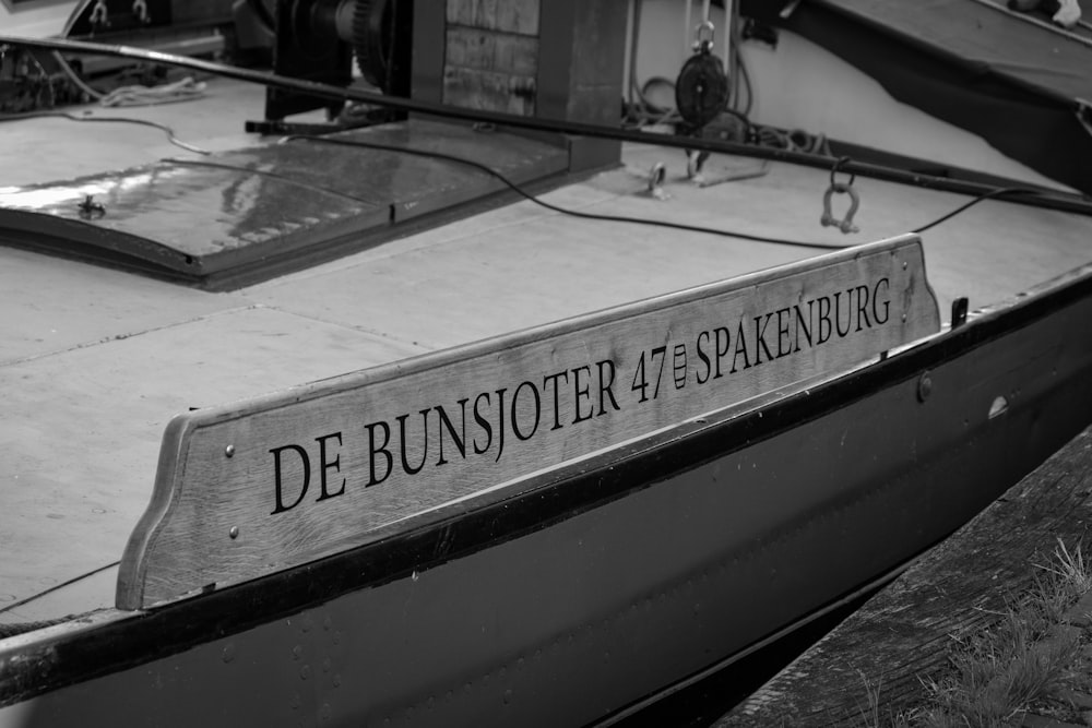 a black and white photo of a boat