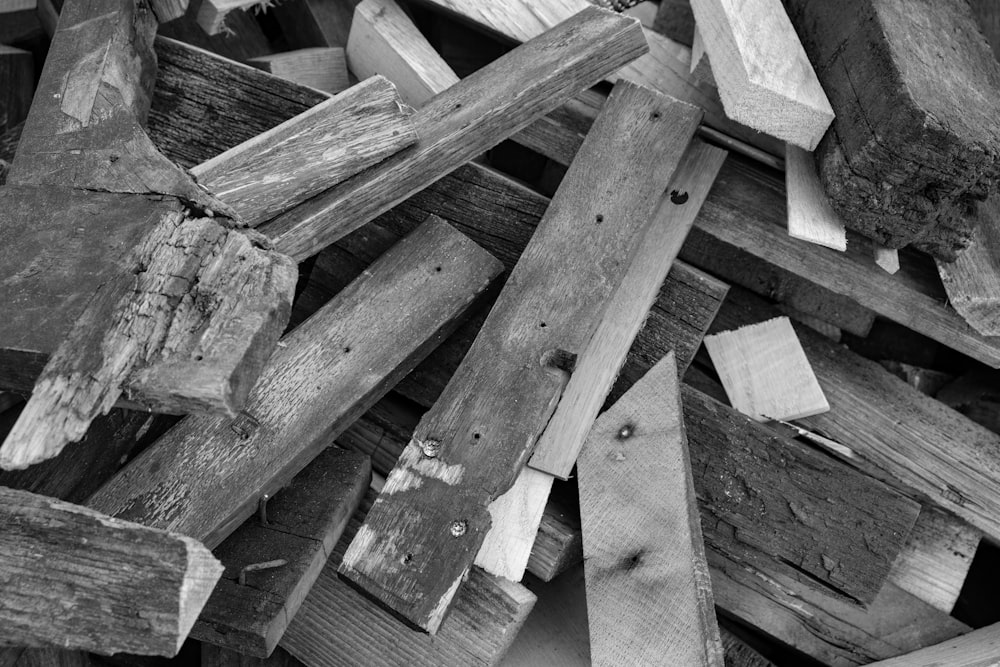 a pile of wooden planks piled on top of each other