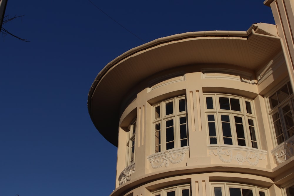 a tall building with a clock on the side of it