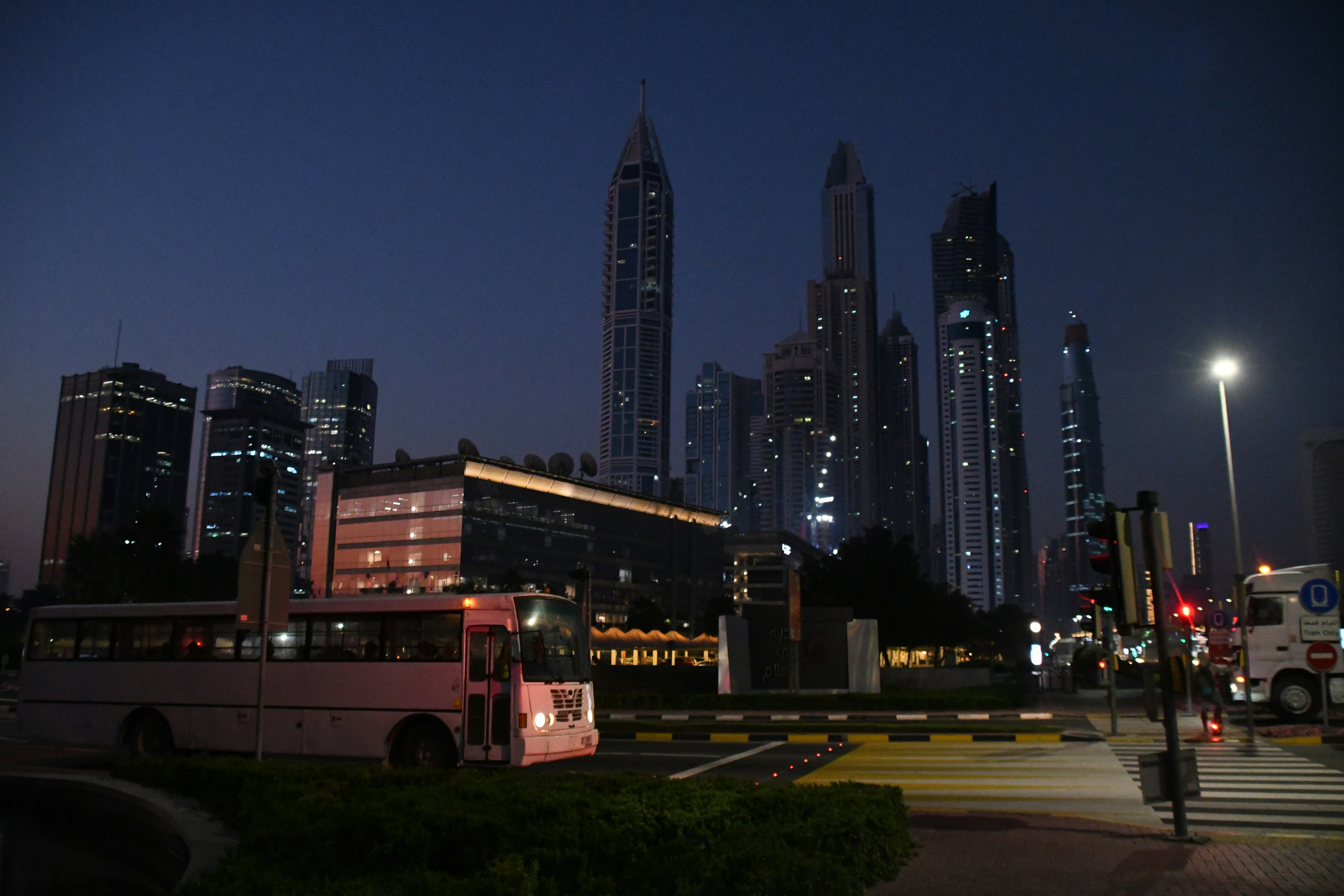 A lineup of different styles and sizes of rental buses in Dubai