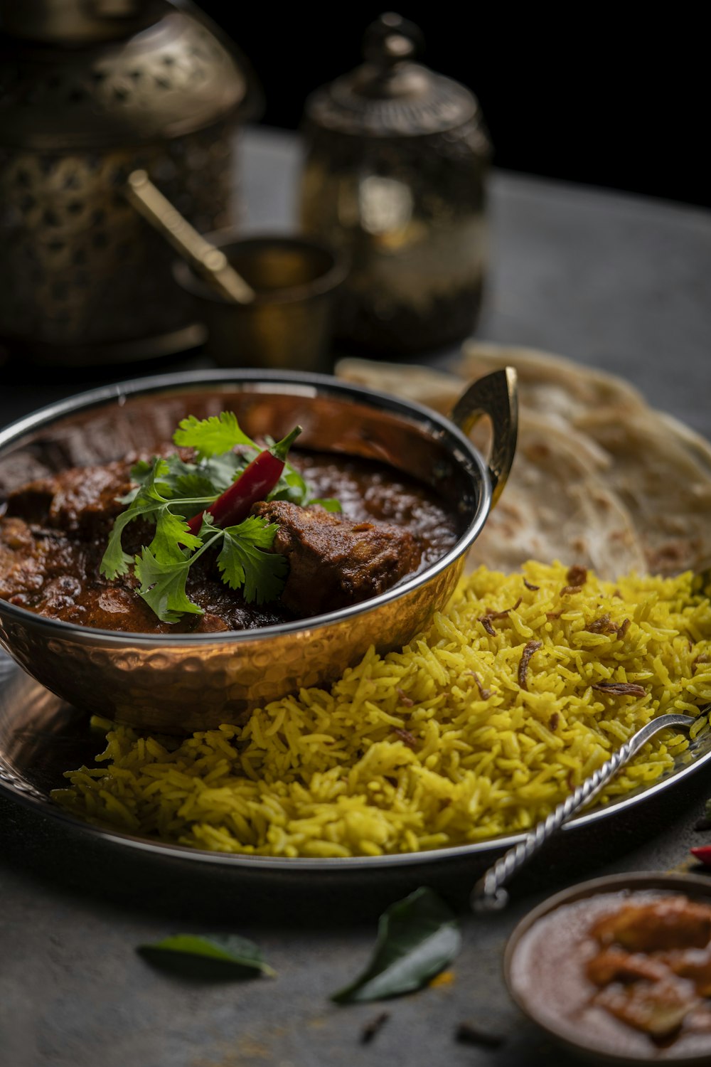 a plate of food with rice and meat