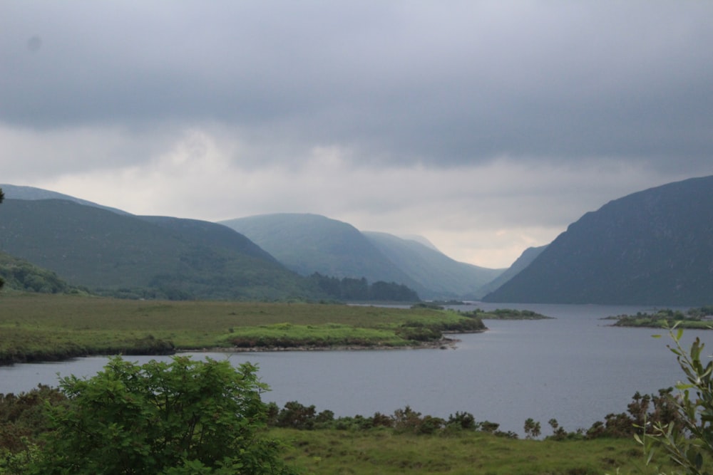 a large body of water surrounded by mountains