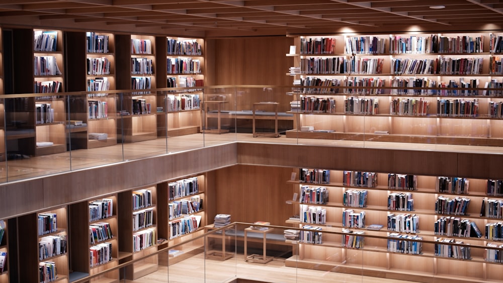 a room filled with lots of shelves filled with books