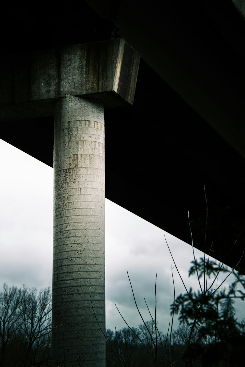 a view of the underside of a bridge