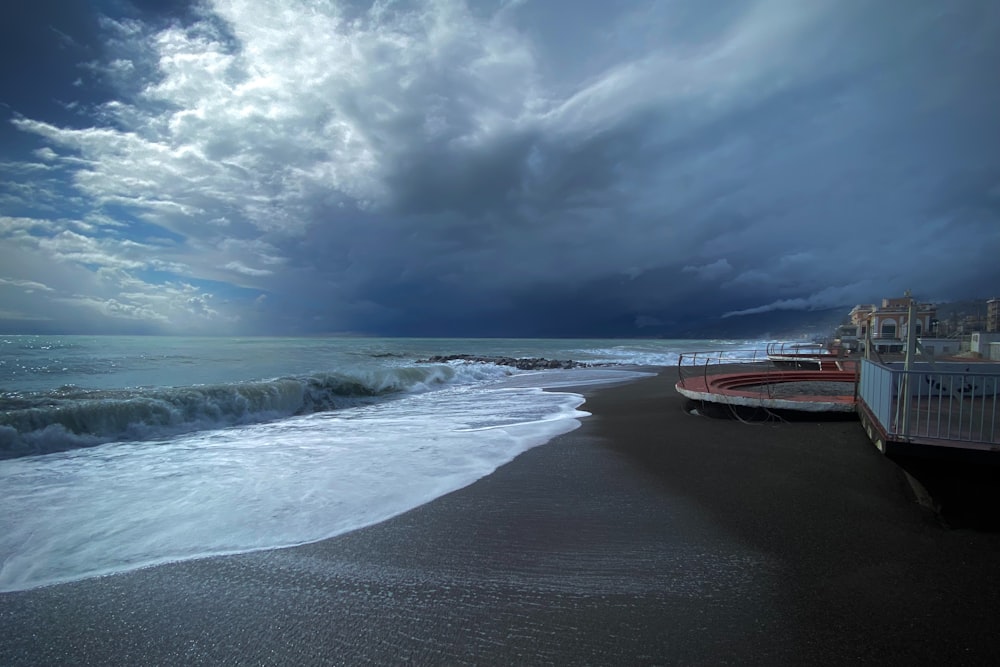 a beach with waves coming in to the shore