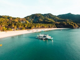 a boat in the middle of a body of water