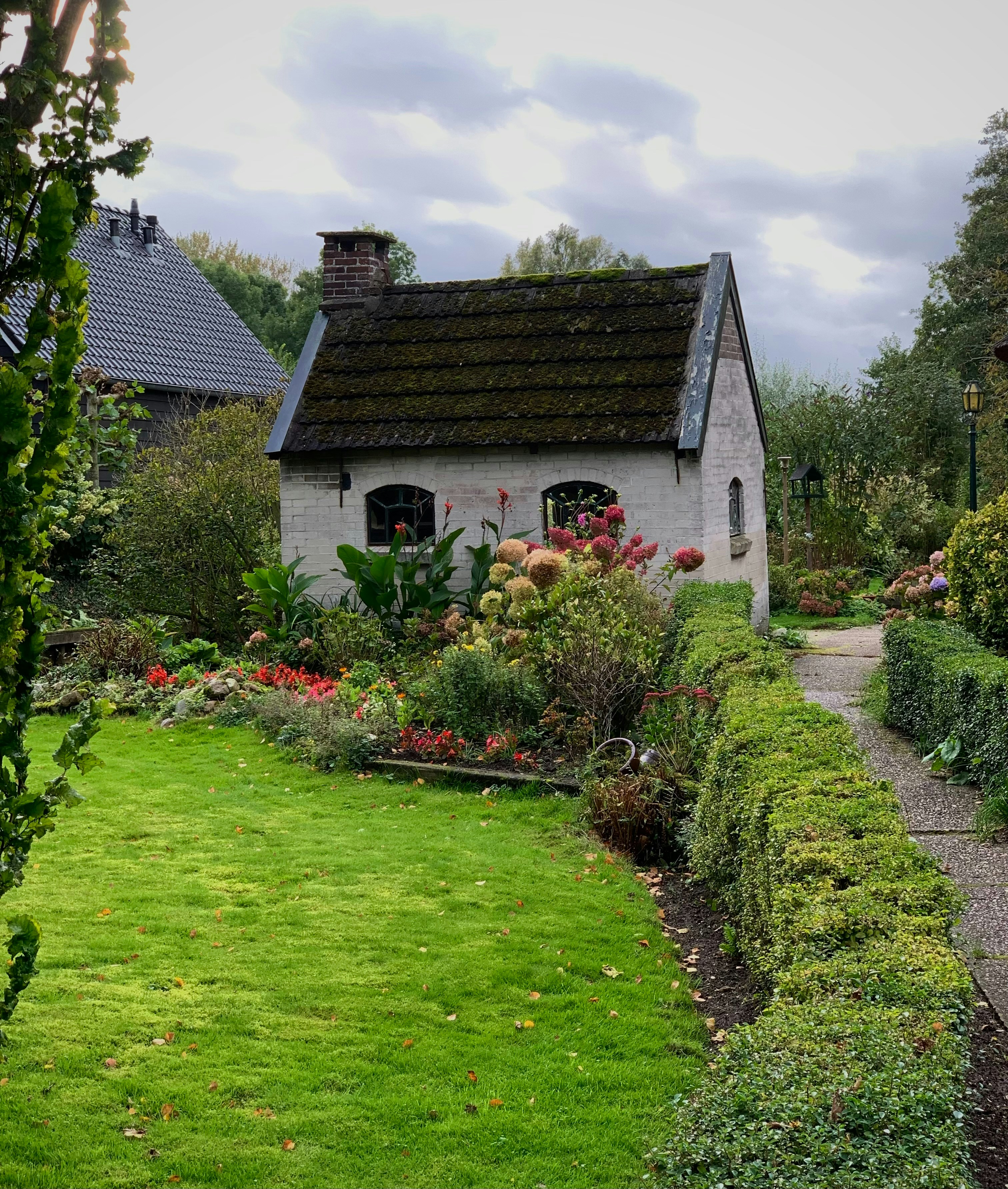 a house with a garden in front of it