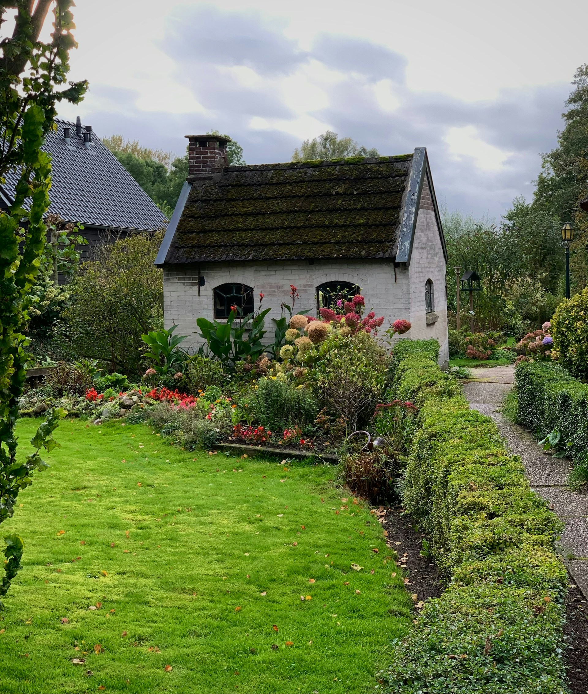 a house with a garden in front of it