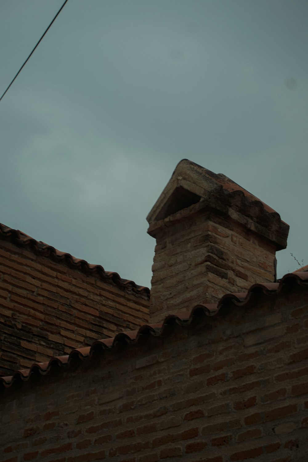 a brick chimney on top of a building