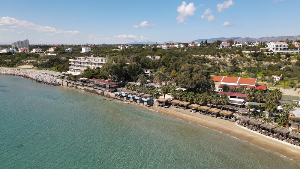 an aerial view of a beach and a resort