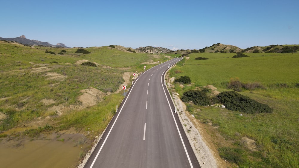 an aerial view of a highway in the middle of nowhere