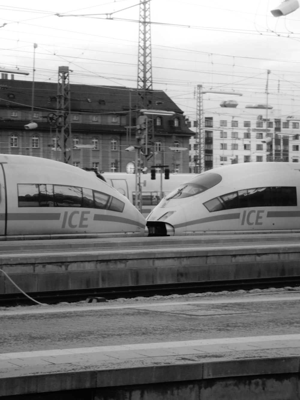 a couple of trains that are sitting on the tracks