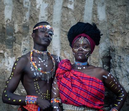 a couple of people standing next to each other