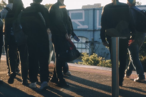 a group of people standing next to each other