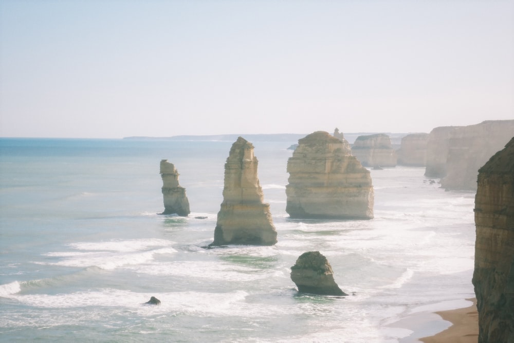 a view of the ocean and rocks in the water