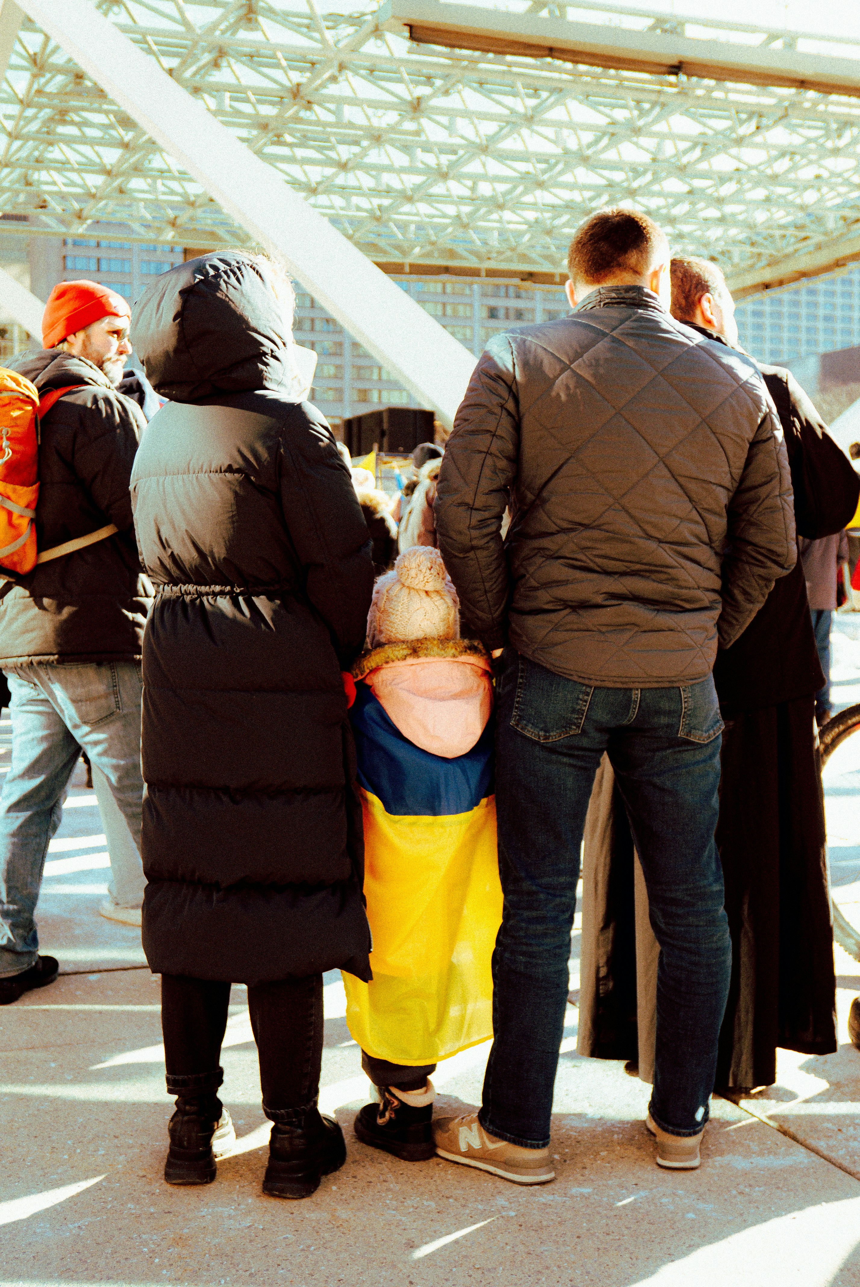 a group of people standing next to each other