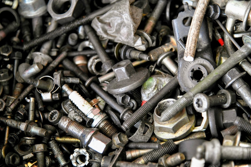 a pile of assorted nuts and bolts