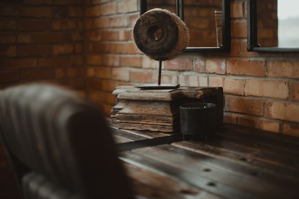 a room with a wooden table and a mirror