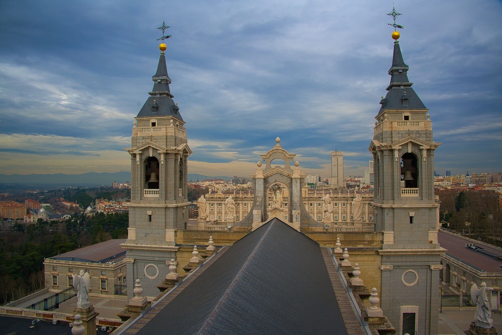 a view of a large building with two towers