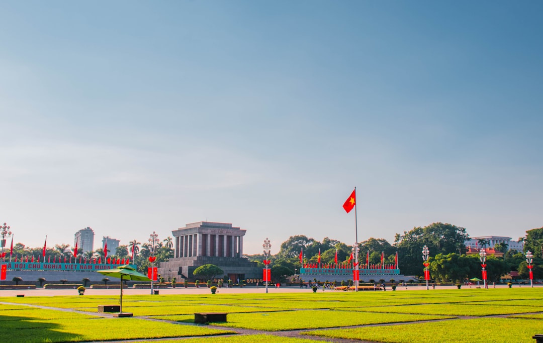 a large grassy field with a building in the background, Ho Chi Minh Mausoleum, photo 2