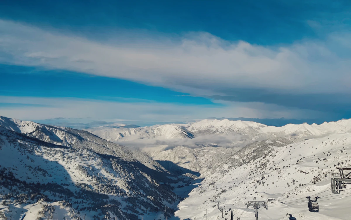 Snowy ski lift on the mountain above Soldeu