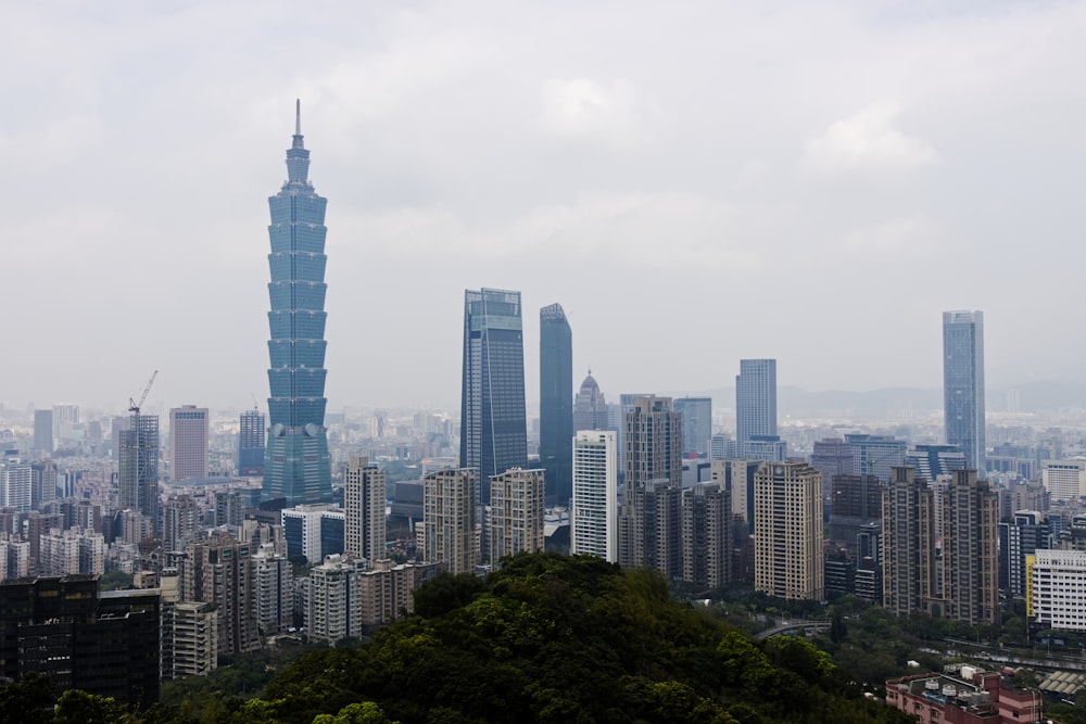 a view of a city with tall buildings