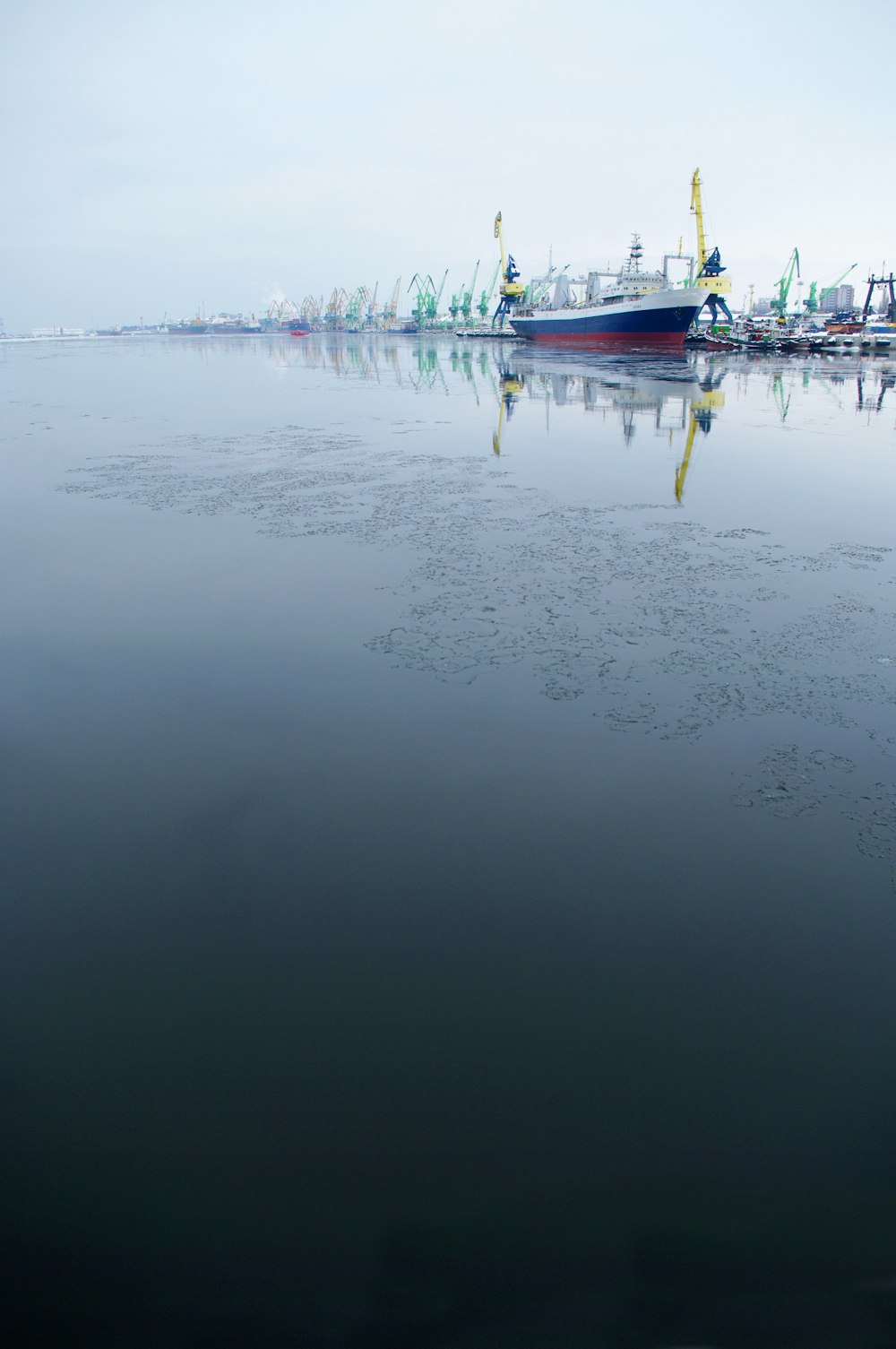 a large boat floating on top of a large body of water