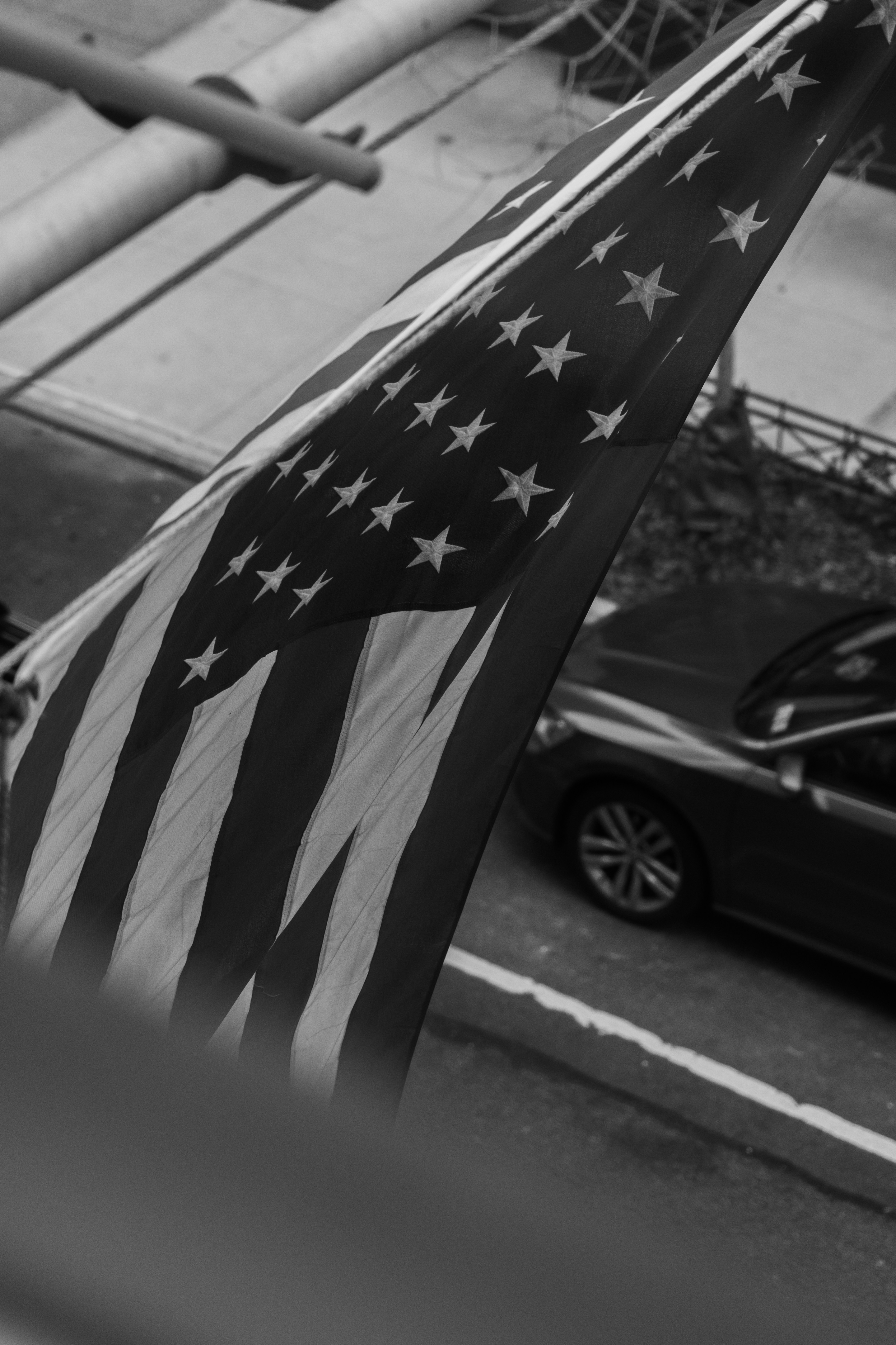 a black and white photo of an american flag